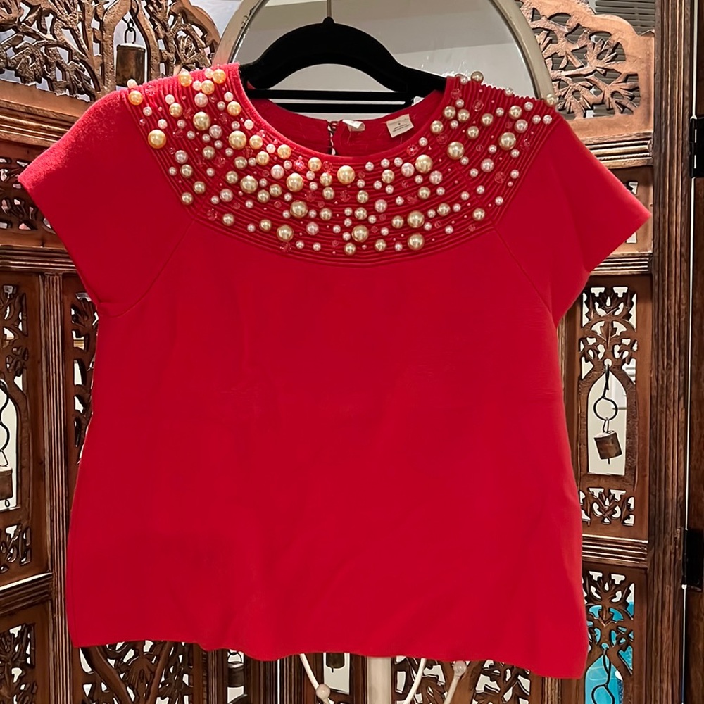 Very elegant knit sweater, with pearls in beautiful orange color!